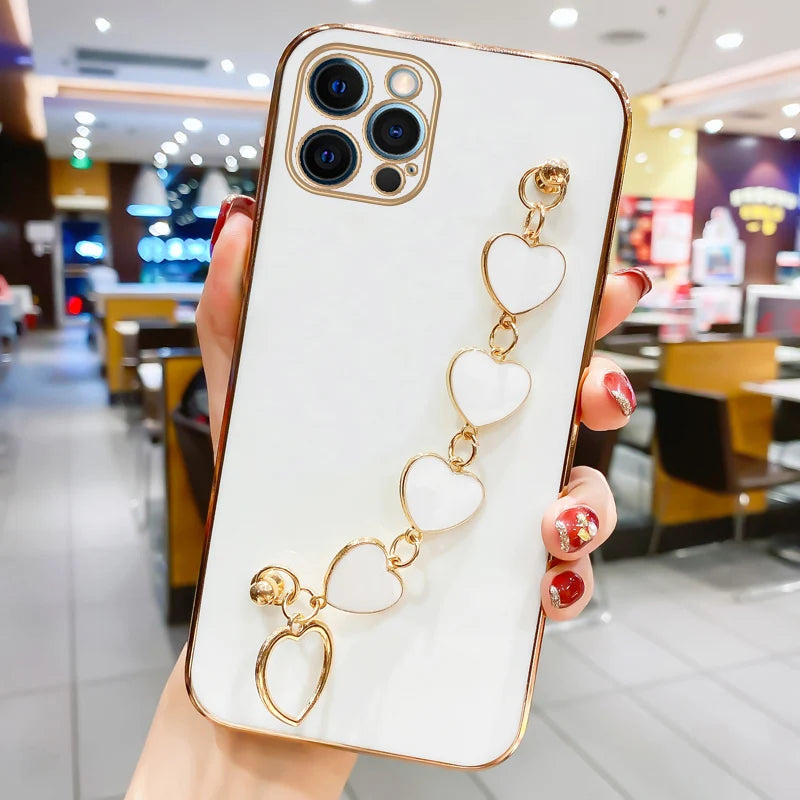 Funda con cadena y pulsera con forma de corazón chapado a la moda para iPhone 14, 15, 16 Pro Max Plus, funda a prueba de golpes