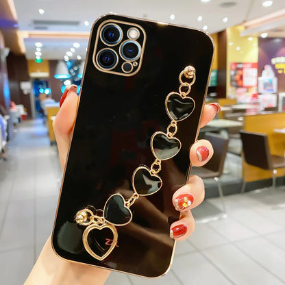 Funda con cadena y pulsera con forma de corazón chapado a la moda para iPhone 14, 15, 16 Pro Max Plus, funda a prueba de golpes