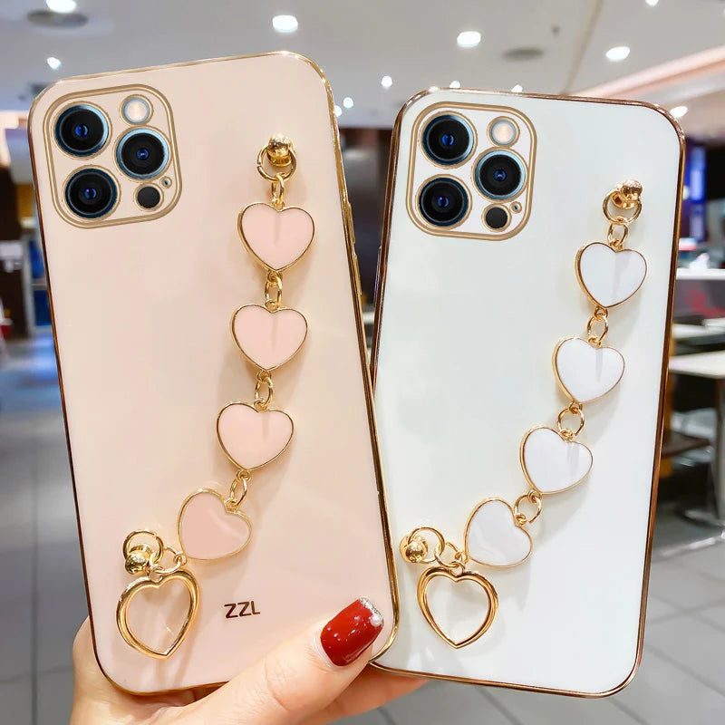 Funda con cadena y pulsera con forma de corazón chapado a la moda para iPhone 14, 15, 16 Pro Max Plus, funda a prueba de golpes