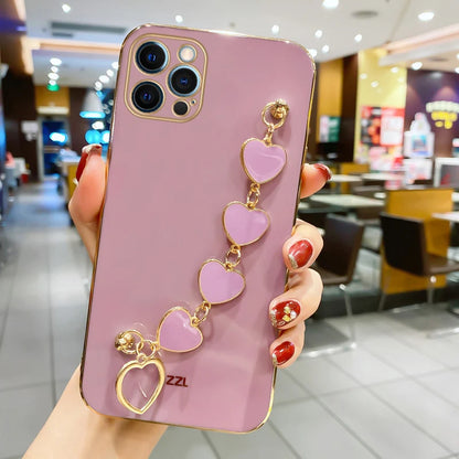 Funda con cadena y pulsera con forma de corazón chapado a la moda para iPhone 14, 15, 16 Pro Max Plus, funda a prueba de golpes